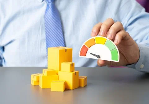 Boxes of goods and a scale pointing to red. Poor product quality and failed.. Stock Photos