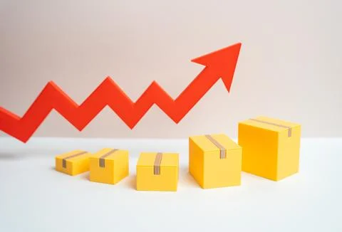Boxes of goods and an upward arrow signal growth in trade. Increased demand b Stock Photos