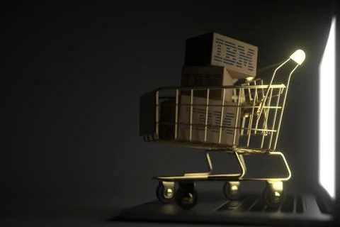 Boxes with IBM logo in golden shopping trolley on the laptop. Editorial premium Stock Illustration