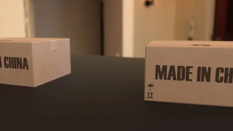 Boxes with MADE IN CHINA text on conveyor. Chinese goods related loopable 3D 스톡 동영상 159160070