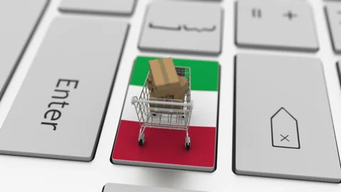 Boxes with MADE IN ITALY text and shopping cart on the keyboard. Conceptual Stock Footage 146747860