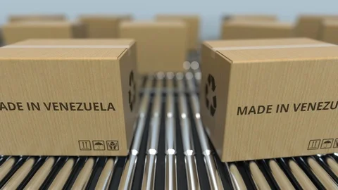 Boxes with MADE IN VENEZUELA text on roller conveyor. Venezuelan goods related Video stock 108868134