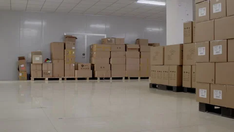 Boxes neatly stacked in a warehouse. Labeled cartons in a storage facility Stock Footage 274254135