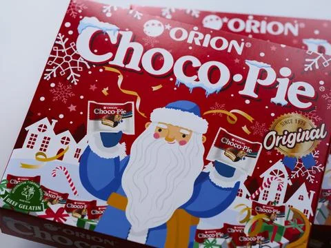 Boxes of Orion Choco-Pie snacks with red Christmas packaging. Stock Photos