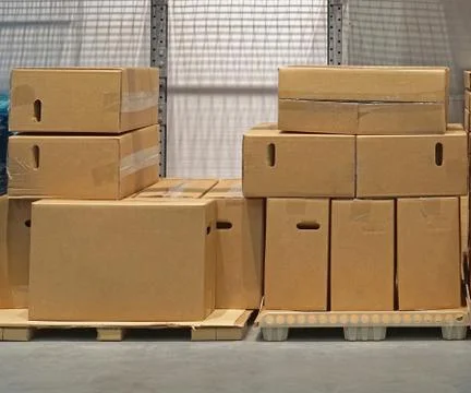 Boxes at pallets Stock Photos