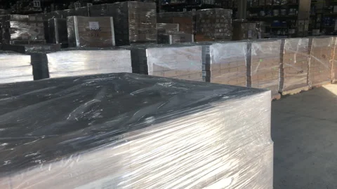 Boxes on Pallets Prepared For Shipping on Loading Dock Stock Footage 256056246