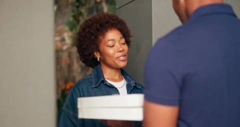 Boxes, pizza delivery and smile of black woman in home entrance for receiving Stock Footage 337548266