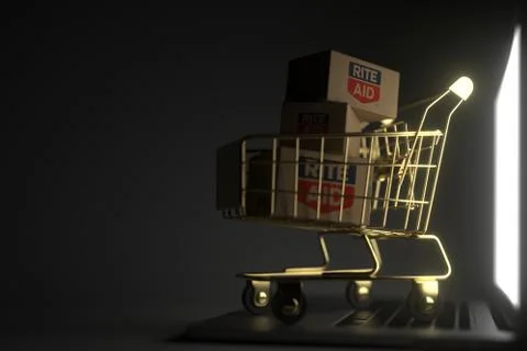 Boxes with RITE AID logo in golden shopping trolley on laptop keyboard Stock Illustration