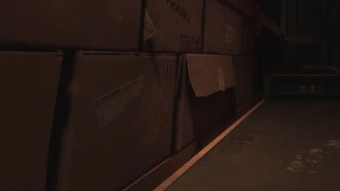 Boxes stacked in a narrow storage space during a late afternoon Stock Footage 345044357