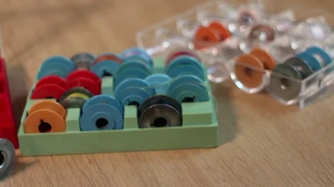 Boxes with tailor bobbins Stock Footage 75648276