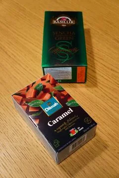 Boxes of tea stacked on a table, side by side 写真素材