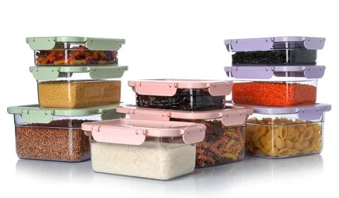 Boxes with uncooked products on white background Stock Photos