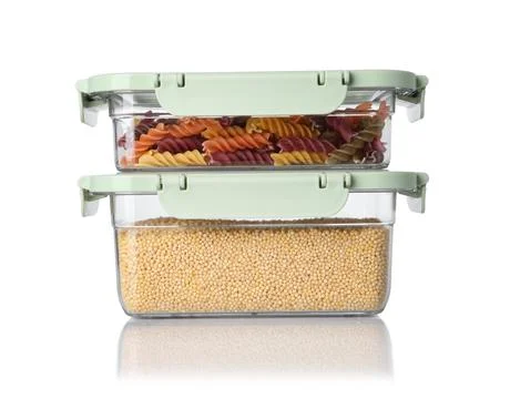 Boxes with uncooked products on white background 스톡 사진