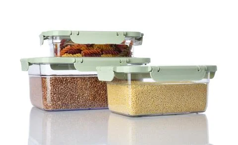 Boxes with uncooked products on white background 스톡 사진