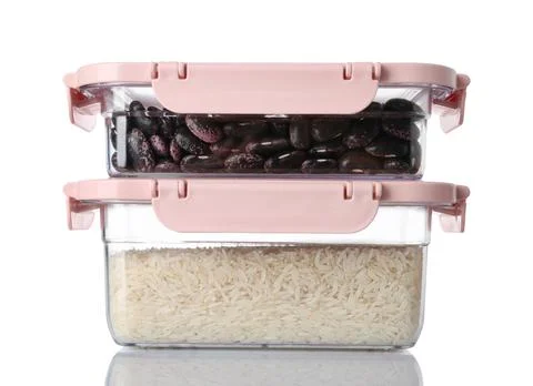 Boxes with uncooked products on white background 스톡 사진