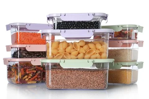 Boxes with uncooked products on white background 스톡 사진