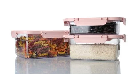 Boxes with uncooked products on white background Stock Photos