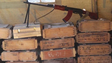 Boxes with weapons and ammunition in a military camp Vídeo Stock 67828452