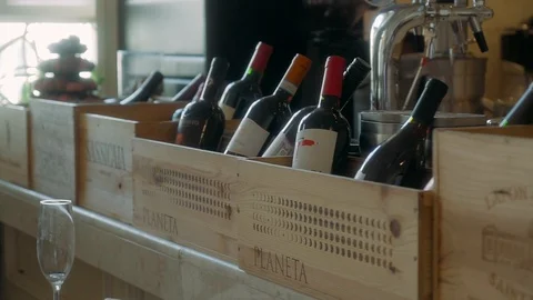  boxes of wine stand in rows near the bar Stock Footage 123040228