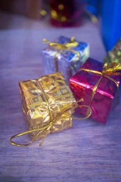 Boxes wrapped with shiny gift wrap Fotos de archivo