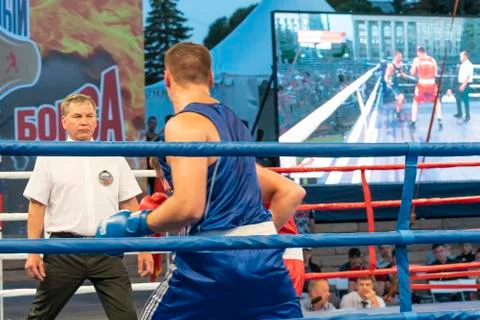 Boxing, a Boxing match between two blue and red boxers Stock Photos