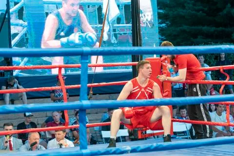 Boxing, a Boxing match between two blue and red boxers Stock Photos