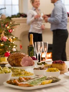 Boxing Day Buffet Lunch Christmas Tree and Log Fire Stock Photos
