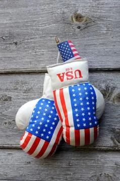 Boxing gloves and tiny us flag Stock Photos