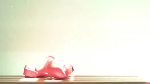 Boxing gloves on a bench Stock Footage 27647341