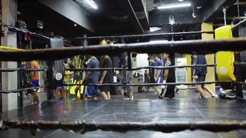 Boxing Gym Training Session Viewed Through Ring Ropes Stock Footage 332680475