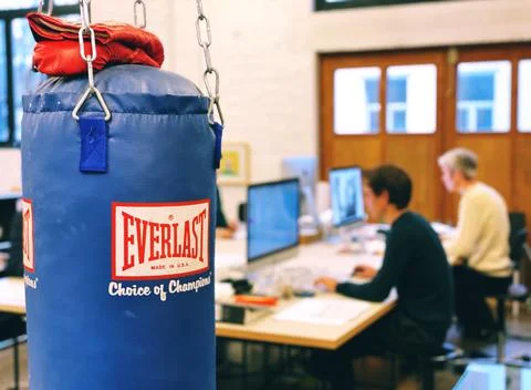 Boxing in the office Stock Photos