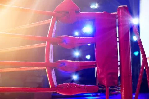 Boxing ring red corner and floodlights, dramatic lighting Fotos Stock