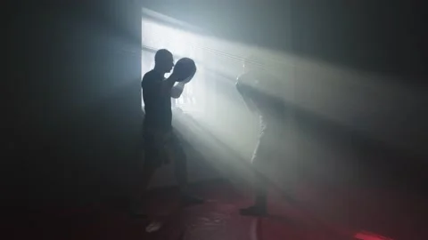 Boxing training in the gym with a coach. Vídeos de archivo 236900685