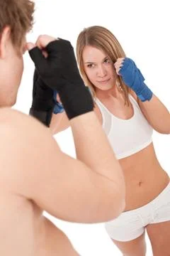 Boxing - young woman in class training on white Stock Photos