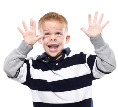 Boy (4-5) pressing face and hands on glass, portrait Stock Photos