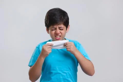 Boy about to sneeze Stock Photos