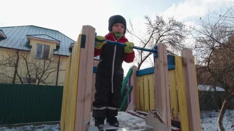 Boy Is Afraid To Slide Slow Motion Stock Footage 168984929