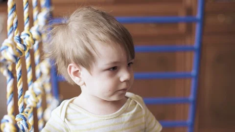 Boy is afraid of a working 스톡 동영상 127688593