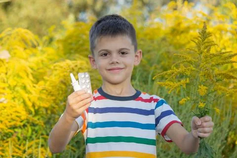 Boy allergic to ragweed. Selective focus Stock Photos