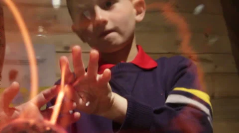 Boy Amazed with the tricks of the FireBall Stock Footage 36141869