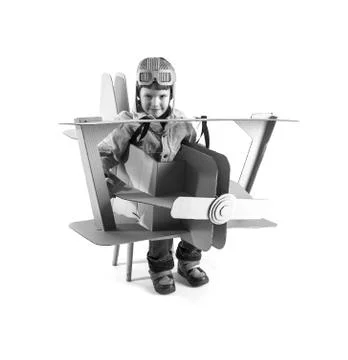 Boy and biplane. Stock Photos