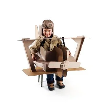 Boy and biplane. Stock Photos