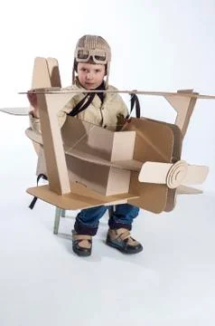 Boy and biplane. Foto stock