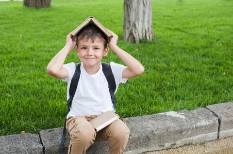Boy and book Stock Photos