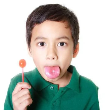Boy and candy Stock Photos
