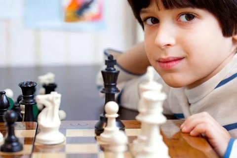 Boy and chess, close-up Foto stock