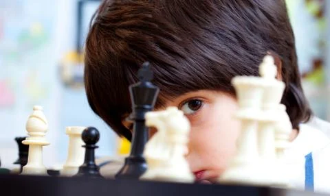 Boy and chess Foto stock