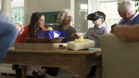 Boy and family using virtual reality headset. Stock Footage 88020896