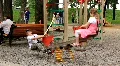 Boy and girl on seesaw HD Footage