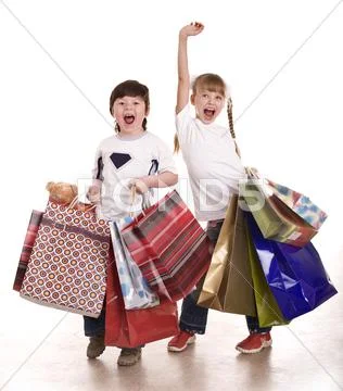 Boy and girl with shopping bag. Stock Photos